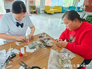 鄄城农商银行闫什支行贴心兑换残损币,践行金融机构社会责任