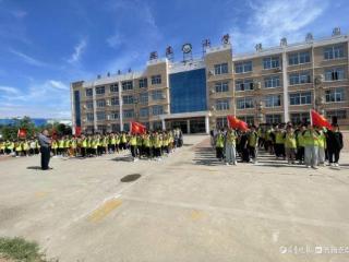 广平镇麻庄小学举行第三次流动红旗传递活动