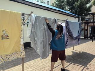 济阳街道南门社区开展“温情网格 暖阳入家”志愿服务活动