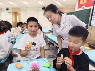 落实“双减”育健康——学府实小与高校携手开展营养主题活动
