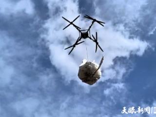 洪水“吞”桥后，无人机架起榕江灾区“空中生命线”