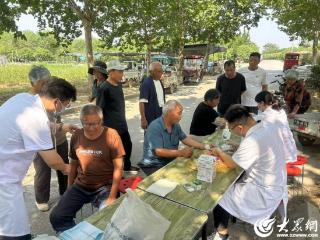 曹县中医医院走进磐石街道路庄村开展“中医生活化社区行”活动
