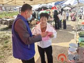 民族政策进山会 法治春风暖民心——胶州里岔镇开展“民族宗教政策法规赶大集”宣传活动