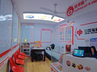 福彩销售员张益凤：二十五年小站传大爱，一盏灯火暖港城