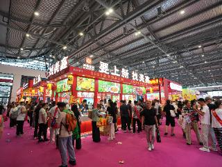 用多彩线编织保障网 郑州火锅展彰显会展名城软实力