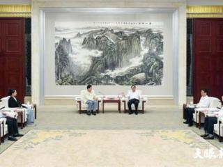 徐麟会见美特斯邦威董事长周成建一行