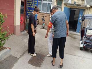 雨后巡查保平安 网格志愿守家园