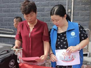 秦庄社区开展运河大集暨“守护居民钱袋子”反诈宣传活动