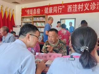 “情暖桑榆·健康同行”义诊活动走进高陵镇西洼村