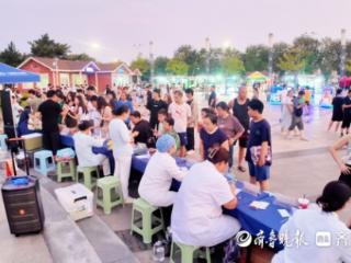 日照港口医院“中医药文化进社区义诊”走进日照灯塔广场