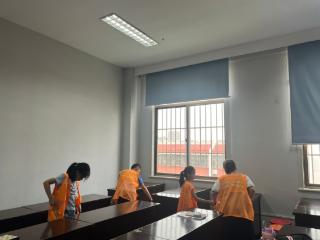 仙营街道暑托班萌娃变身“清洁小卫士”