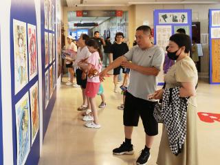 固安：文化馆里过暑假 书画展览润童心