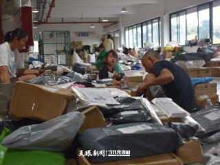 记者手记丨邮政快递员的“国企担当”
