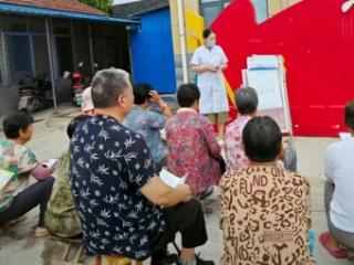 【胡同宣讲】济南市莱芜区寨里镇涝坡村开展“残疾预防日”宣讲活动