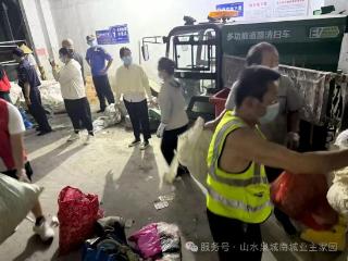 狠治杂物除隐患 信洁物业护平安