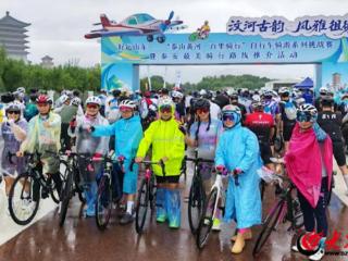 齐鲁银行泰安分行联合“泰山黄河·百里骑行”赛事开展全民反假货币宣传活动