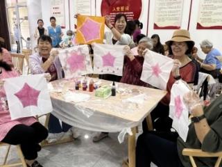 济宁太白湖新区许庄街道南风花园社区开展“扎染颂家国，匠心绘初心”主题活动