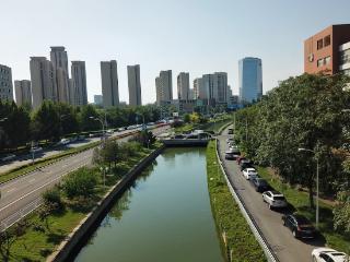 绿色施工焕新河道生态！天津滨海高新区华苑科技园排涝通道提升改造工程完工
