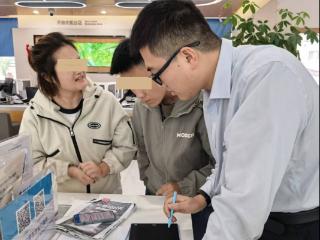 中国银行郓城支行暖心服务助聋哑夫妇解保险难题