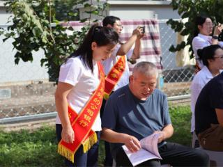 诚信兴商进社区，吉林银行通化分行跨境人民币宣传暖民心