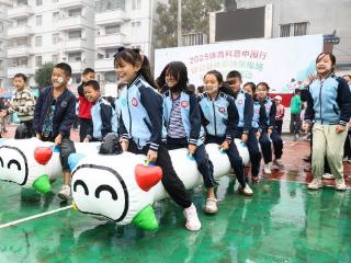 暖意满苗乡 运动向未来 2025 体育科普中国行暨“公益体彩 快乐操场”健康进校园活动走进十八洞村