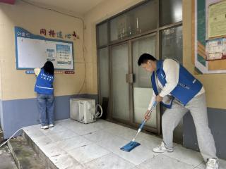 东红庙社区邮电新苑网格室开展卫生清洁志愿服务活动