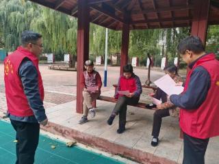 济南市莱芜区凤城街道石花园社区联合“双报到”单位开展防范非法集资宣传活动