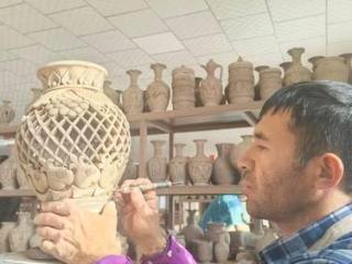 赣疆共续“泥火情” 千年土陶焕新生