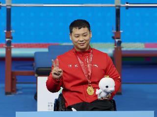 齐勇凯全国残运会上实现三连冠：“举重让我更自信更阳光”