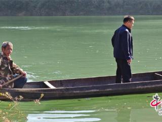 “孤岛”郑家河告别世代依靠手划木船出行的历史