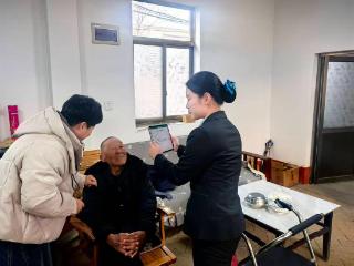 雪天暖情送服务 农行温情暖人心