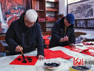 河北省迁安市：翰墨迎春 瑞马送福