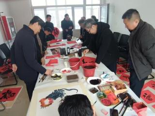 文化进社区走进徐家楼农贸市场 翰墨飘香迎春送福