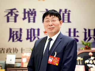 河南省政协委员潘伟斌：告别“千村一面”，让乡村“万紫千红”