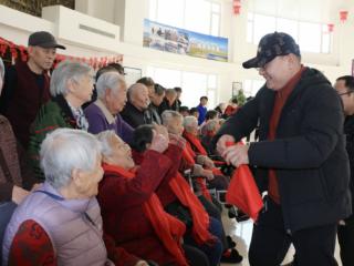 新春走基层丨镇赉县“万福进万家”公益拍摄送福到家门