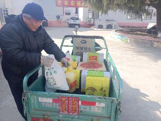 新春暖意浓——济南市莱芜区方下街道铁牛岭村举办年终福利发放暨敬老回馈乡亲父老慰问活动