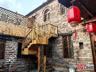 新春走基层丨“我在600年古寨里管民宿”