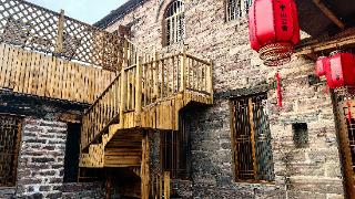 新春走基层丨“我在600年古寨里管民宿”