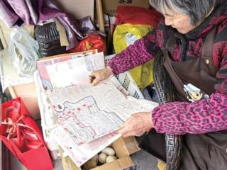 王奶奶义务帮村民卖菜 不识字用“象形记账法”从未出过差错