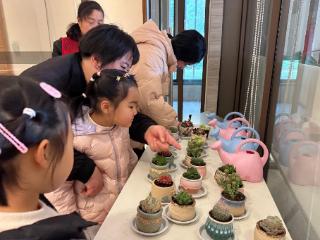 车坊社区：指尖缠花叙法意，巾帼护绿展芳华