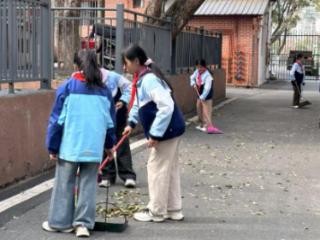 新余市明志小学开展学雷锋志愿服务活动
