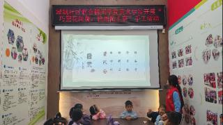 德州天衢新区长河街道绿城社区联合德州学院美术学院开展“巧塑花间趣,轻拈陌上春”