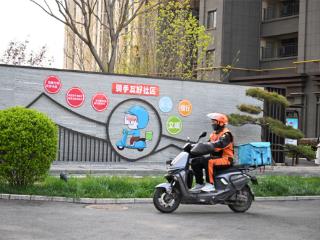“骑手友好社区”为城市添暖