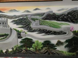 池州男子手绘长城网上走红，以墙绘为生月入万元