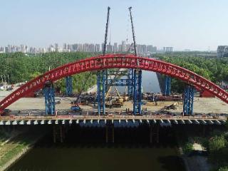 新安江路跨店埠河大桥主副拱顺利合龙