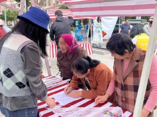 淞涛社区开展“春日暖阳，便民‘筝’情”主题活动