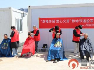 致敬一线劳动者——垎塔埠街道开展工地爱心义剪活动