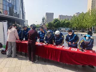 泰山区图书馆开展全民阅读倡议签名暨条例宣传活动