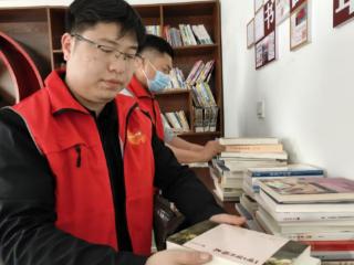 平安融易邯郸分公司开展“书香润社区”公益活动