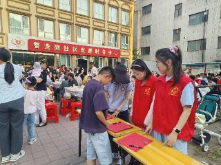莒南县磐龙湖社区：邻里长桌宴 共话邻里情